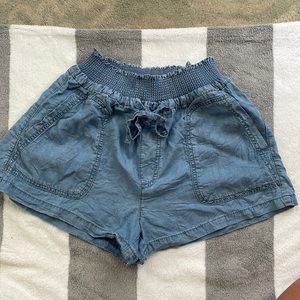 Love Tree Sz S blue denim color shorts. Elastic waist external drawstring. EUC